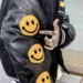 Furry-Smiley-Patchwork-Varsity-Bomber-Black-Jacket.jpg
